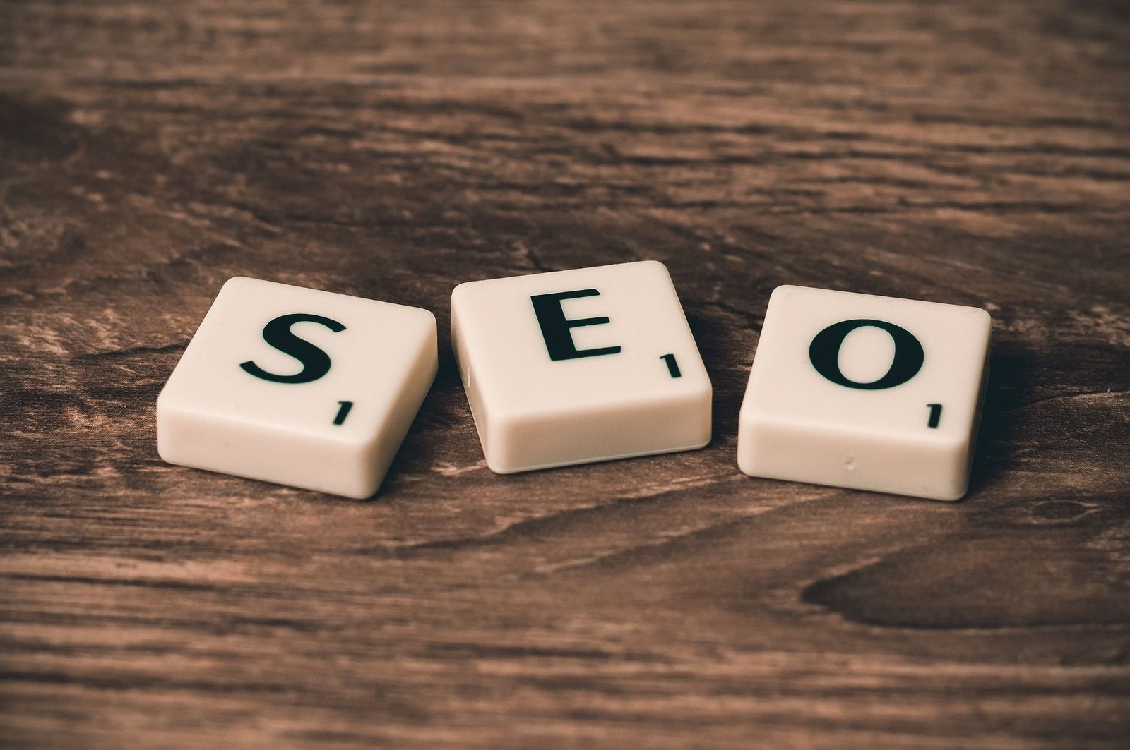 SEO letter tiles on a wooden table